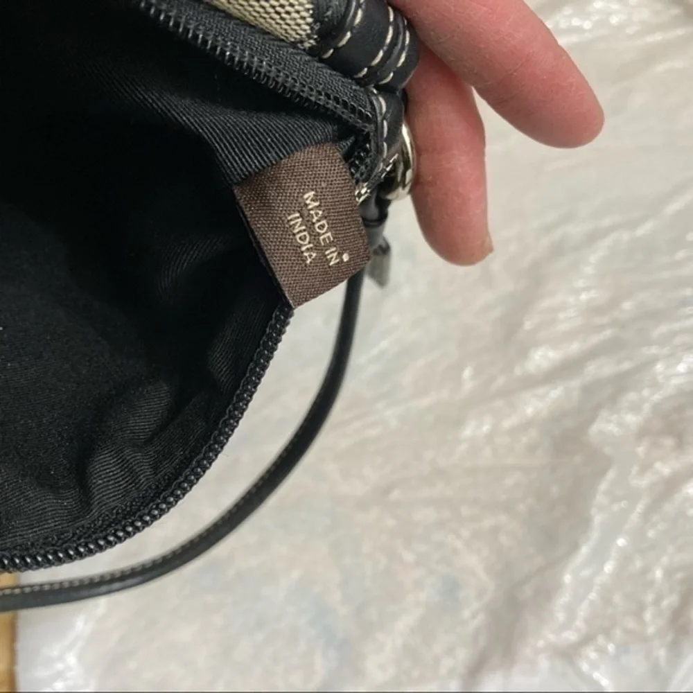 Coach black and gray signature c wristlet bag